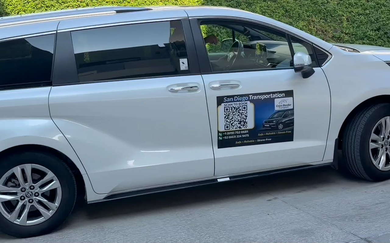 Cross Border Transport Toyota Sienna with the company door magnet
